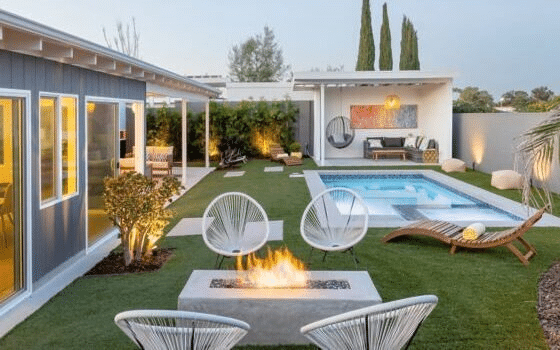 modern backyard with pool and fire pit