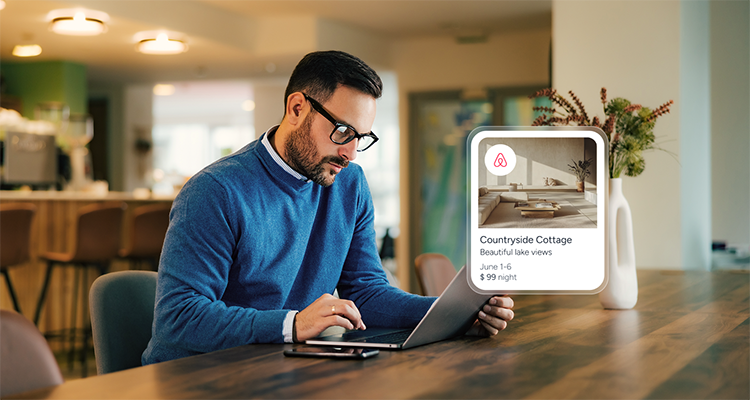 A man with glasses works on a laptop, with an Airbnb listing graphic displayed next to him.